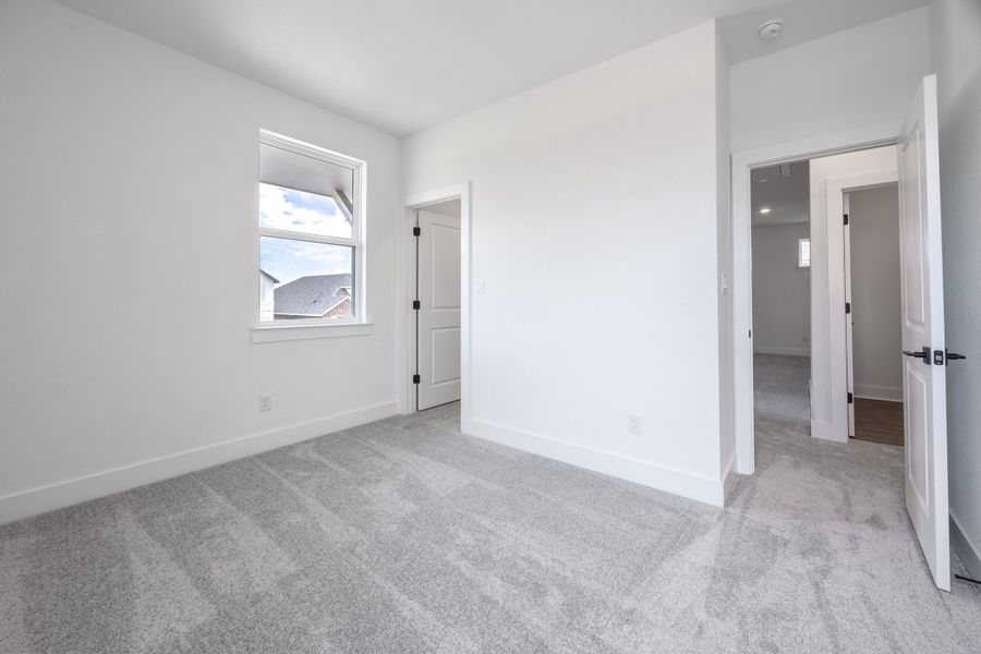 Spacious, unfurnished interior of a new home in Sage Collection – Freedom at Anthem, Kyle (Image 10).