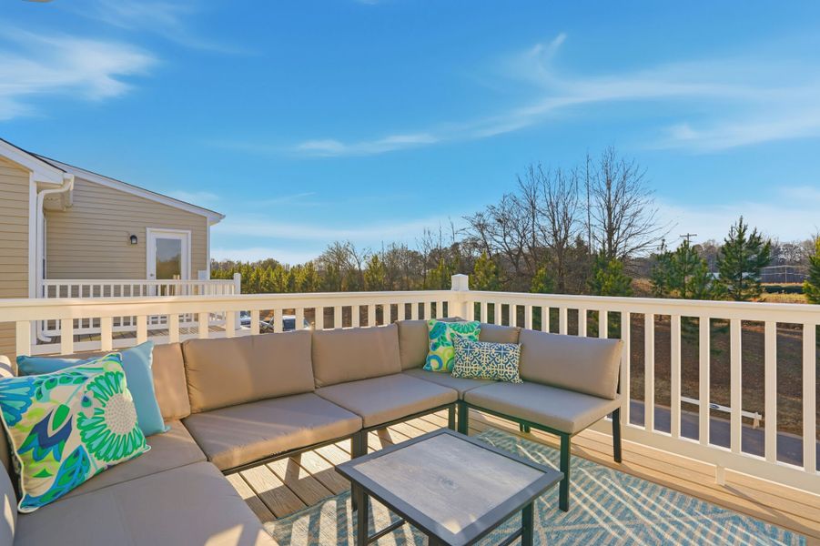 Exterior details and patio area of a home in The Townes at Cheyney, Charlotte (Image 2). Exterior details and patio area of a home in The Townes at Cheyney, Charlotte (Image 2).
