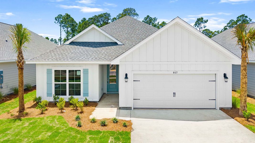 Front exterior of a new home in Breakfast Point East Phase II, Panama City Beach, FL, highlighting curb appeal (Image 1). Front exterior of a new home in Breakfast Point East Phase II, Panama City Beach, FL, highlighting curb appeal (Image 1).