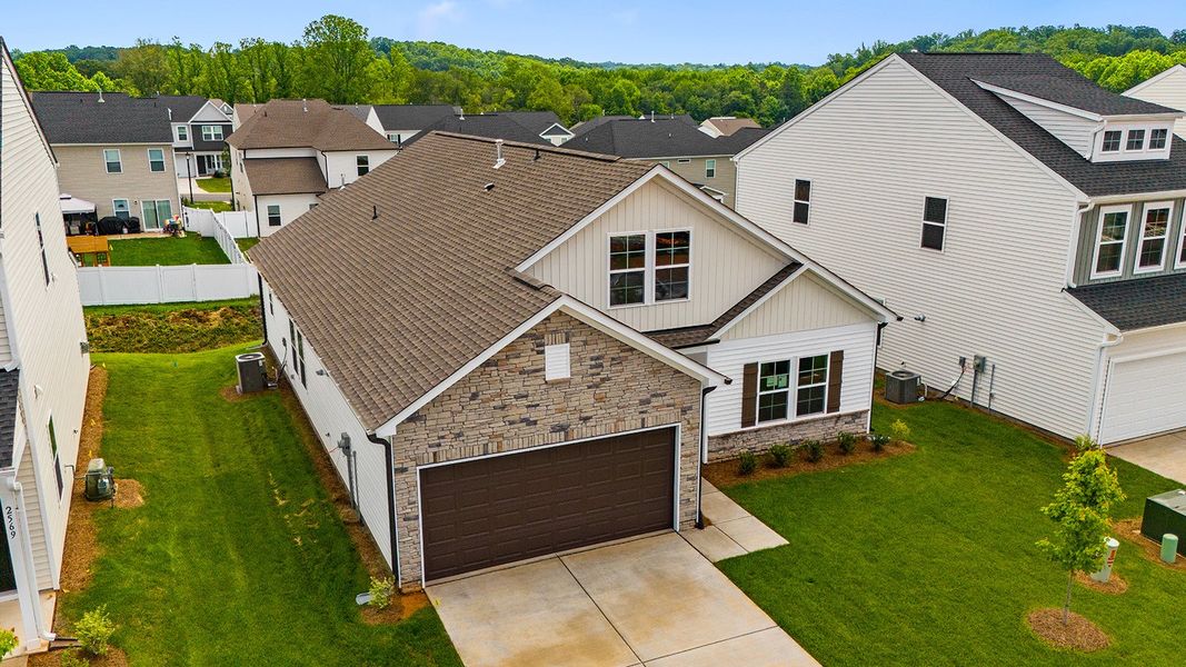 Front exterior of a new home in Hanes Lake, Winston-Salem, NC, highlighting curb appeal (Image 2).