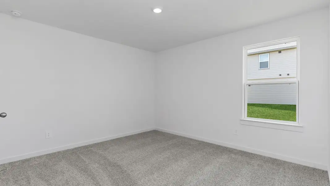 Representative unfurnished interior of a home built from the Burnet - 2199 by D.R. Horton in Harvest Pointe, Needville (Image 11).