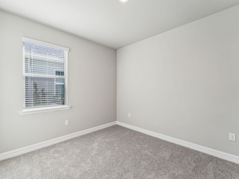 Spacious, unfurnished interior of a new home in Crescent Lakes - Signature Series, Punta Gorda (Image 15).