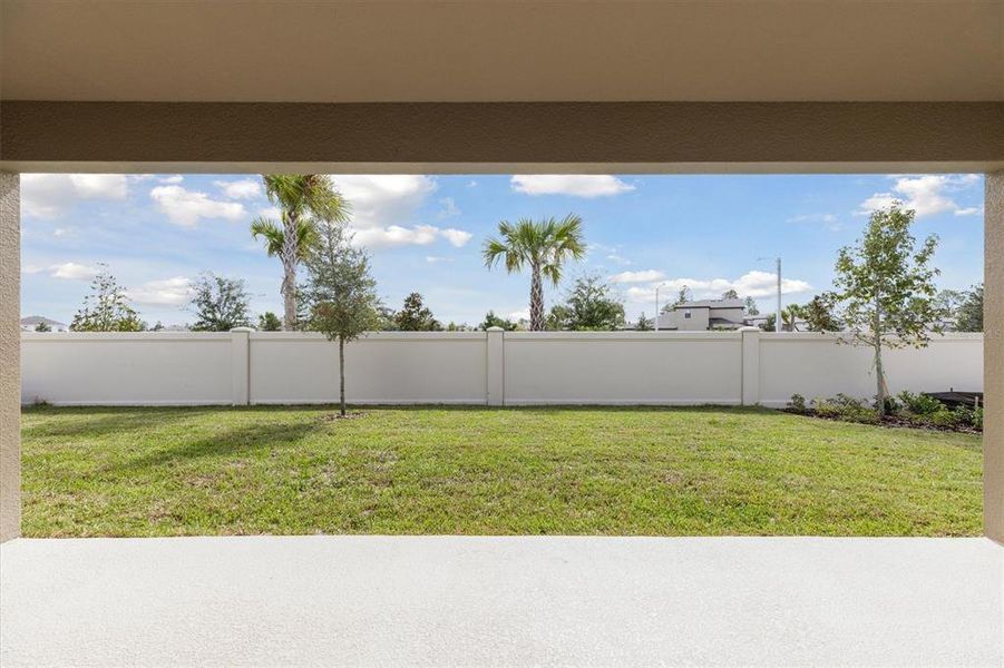 Exterior details and patio area of a home in Caldera, Spring Hill (Image 2).
