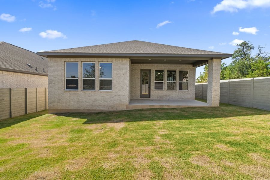 Front exterior of a new home in Arbor Collection At Wolf Ranch, Georgetown, TX, highlighting curb appeal (Image 22).