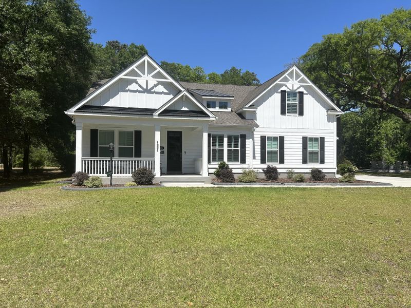 Front exterior of a new home in Kings River Preserve, Hollywood, SC, highlighting curb appeal (Image 1). Front exterior of a new home in Kings River Preserve, Hollywood, SC, highlighting curb appeal (Image 1).