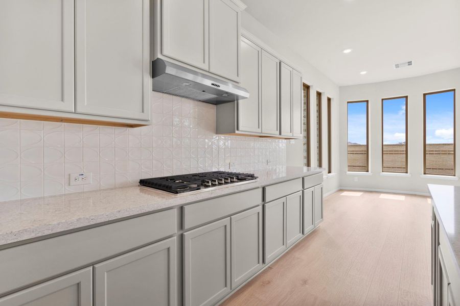 Furnished interior view inside a new home in Bridgeland, Cypress (Image 10).