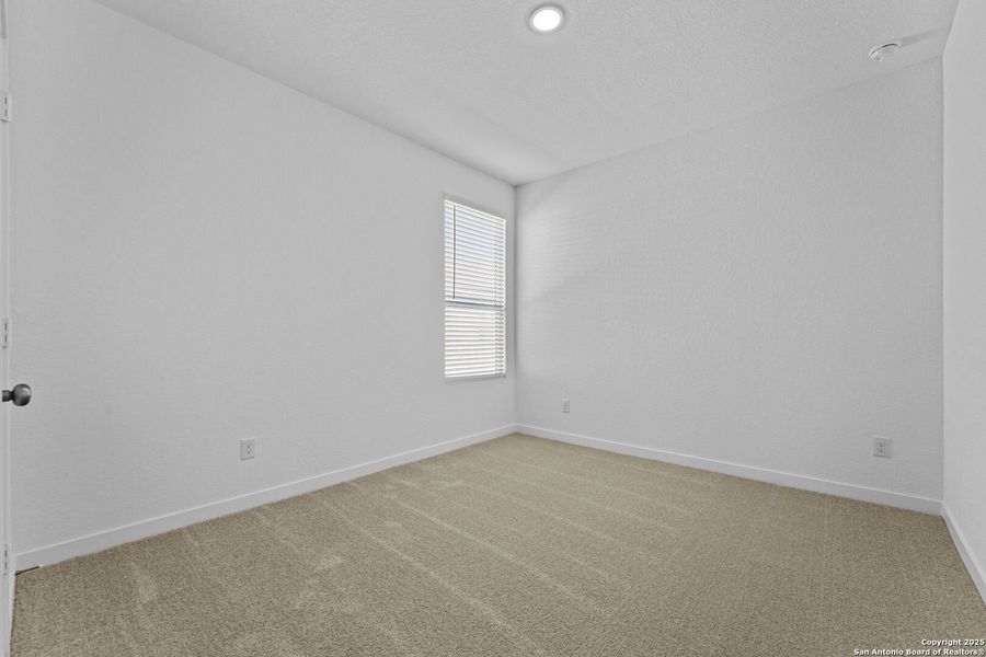 Spacious, unfurnished interior of a new home in Waterwheel: Coastline Collection, San Antonio (Image 18).