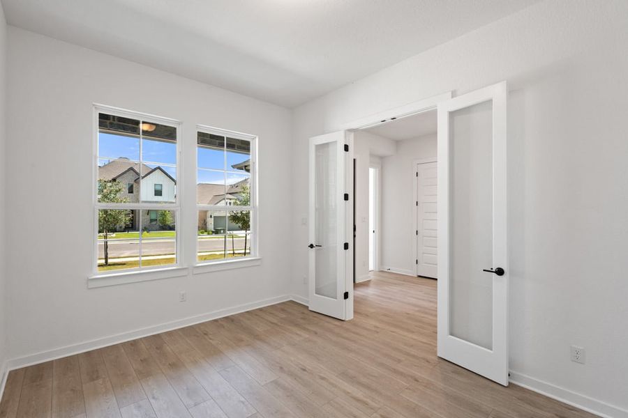 Spacious, unfurnished interior of a new home in Capitol Collection at Lariat, Liberty Hill (Image 42).