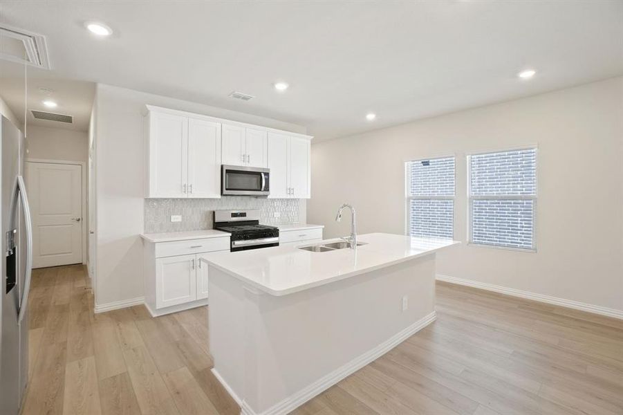 Furnished interior view inside a new home in Eastridge - Spring Series, McKinney (Image 6). Furnished interior view inside a new home in Eastridge - Spring Series, McKinney (Image 6).