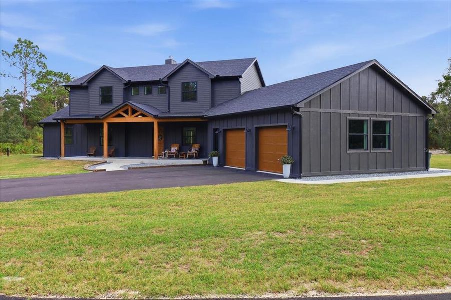 Front exterior of a new home in , Inglis, FL, highlighting curb appeal (Image 33).
