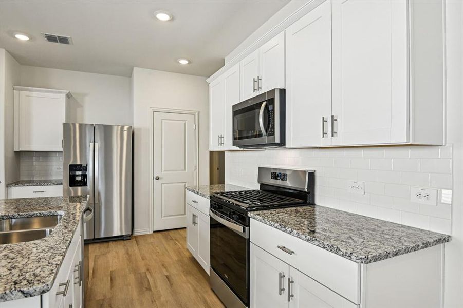 Furnished interior view inside a new home in Lakehaven - Spring Series, Farmersville (Image 15).