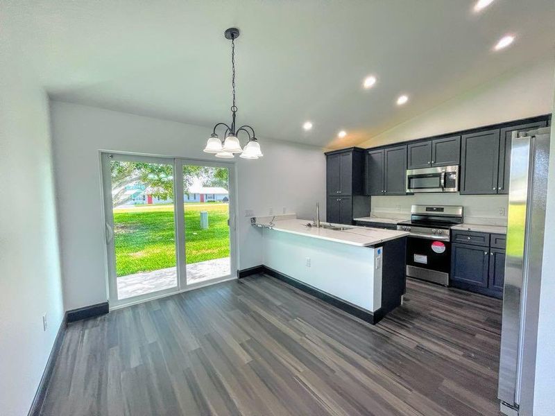 Furnished interior view inside a new home in , Okeechobee (Image 10).