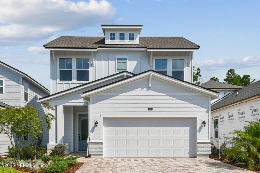 Front exterior of a new home in Seabrook Village 40' Front Entry, Ponte Vedra, FL, highlighting curb appeal (Image 2).