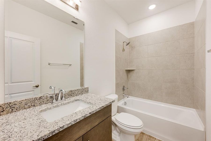 Furnished interior view inside a new home in Bear Creek Elements, Lavon (Image 9).