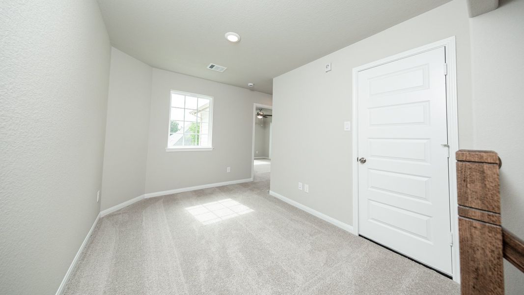 Representative unfurnished interior of a home built from the The Avola - Walden on Lake Conroe by Legend Homes in Lake Conroe Area Homes, Montgomery (Image 14).