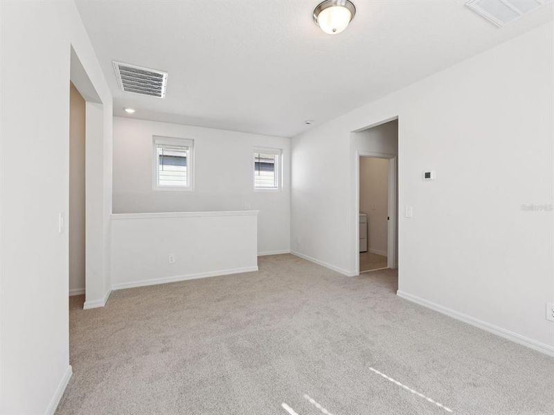 Spacious, unfurnished interior of a new home in The Meadow at Crossprairie Bungalows, St. Cloud (Image 11).