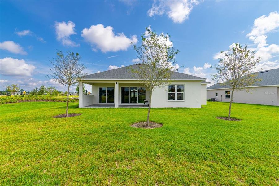 Front exterior of a new home in , Deland, FL, highlighting curb appeal (Image 21).