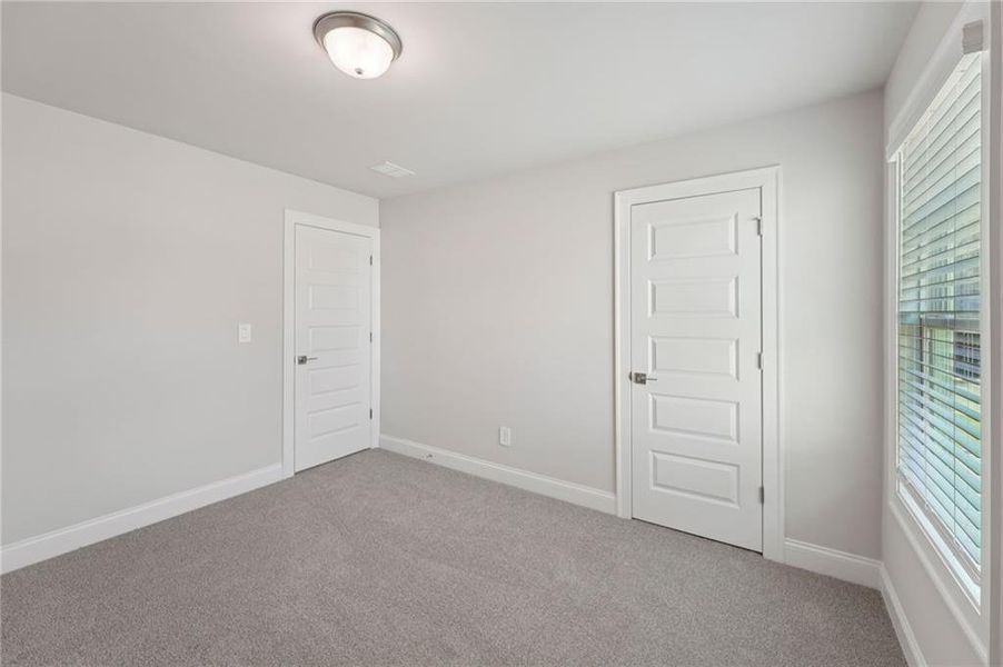 Spacious, unfurnished interior of a new home in Hemingway - Reserve Series, Cumming (Image 50).