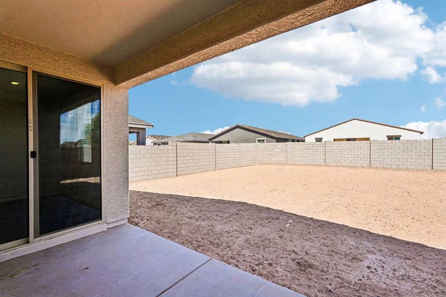 Covered patio to large backyard Covered patio to large backyard