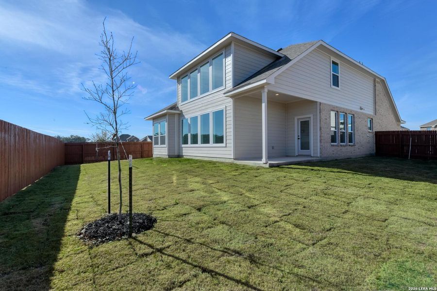 Exterior details and patio area of a home in Megan's Landing, Castroville (Image 3).