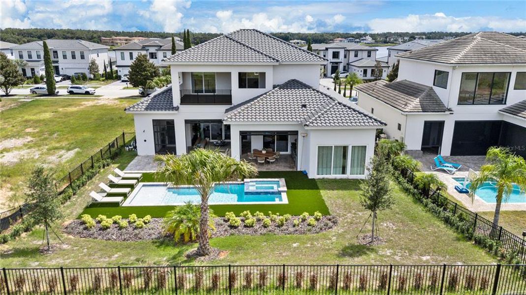Exterior details and patio area of a home in Bella Collina, Montverde (Image 22).