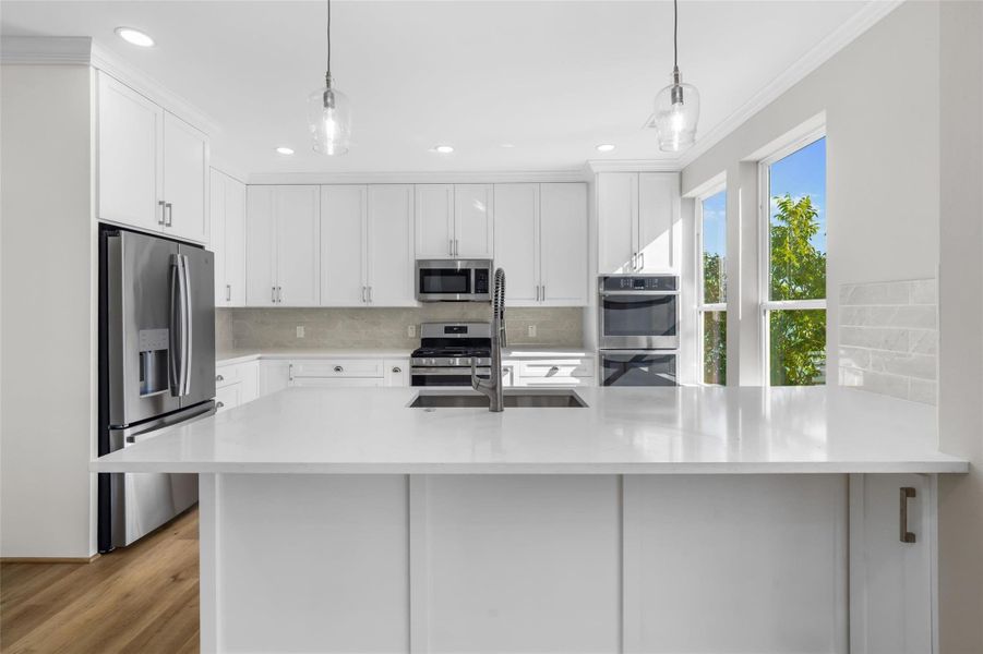 Gourmet kitchen featuring quartz countertops, tons of storage, stainless steel appliances Gourmet kitchen featuring quartz countertops, tons of storage, stainless steel appliances