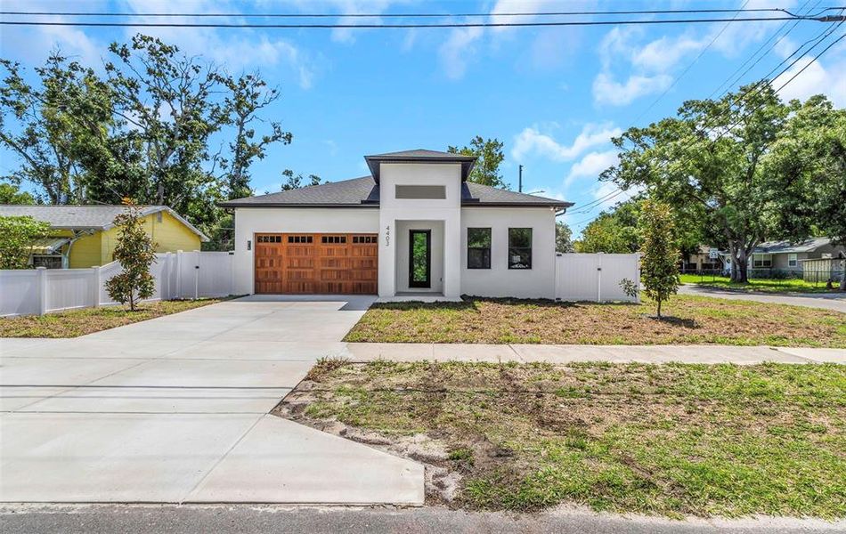 Front exterior of a new home in , St. Petersburg, FL, highlighting curb appeal (Image 2). Front exterior of a new home in , St. Petersburg, FL, highlighting curb appeal (Image 2).