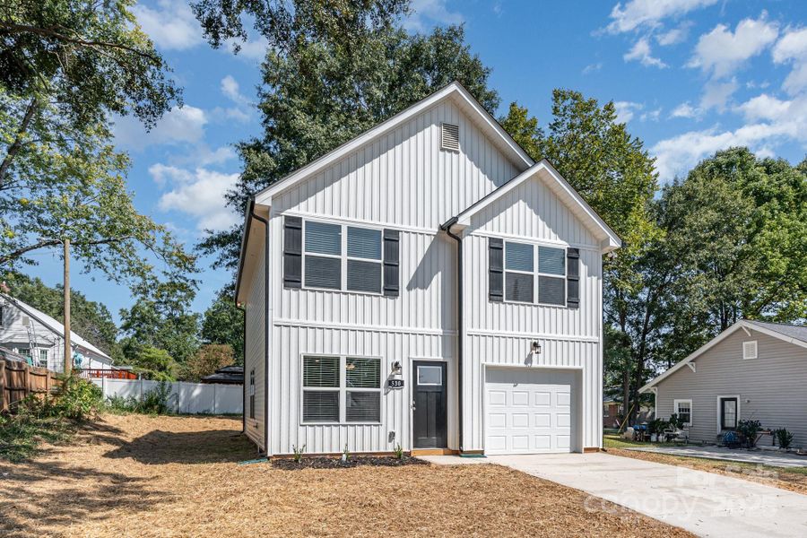 Front exterior of a new home in , Gastonia, NC, highlighting curb appeal (Image 1).