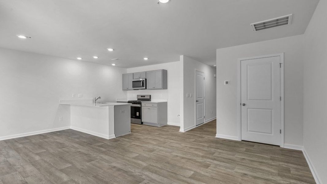 Spacious, unfurnished interior of a new home in The Townes at Honeycutt Oaks, Angier (Image 7). Spacious, unfurnished interior of a new home in The Townes at Honeycutt Oaks, Angier (Image 7).