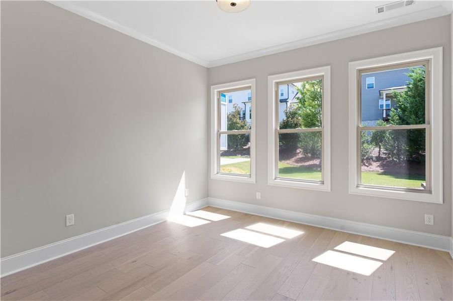 Spacious, unfurnished interior of a new home in Bellwyn, Johns Creek (Image 37).