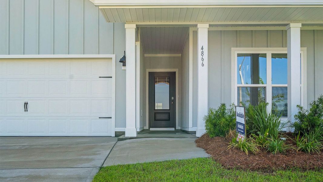Representative exterior photo of a completed home built from the The Delray by D.R. Horton in Titus Park, Panama City, FL (Image 16). Representative exterior photo of a completed home built from the The Delray by D.R. Horton in Titus Park, Panama City, FL (Image 16).