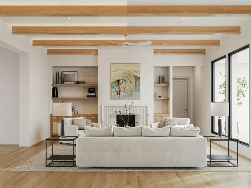 Spacious living area featuring exposed wood-finish ceiling beams, recessed lighting, and wood-finish flooring
