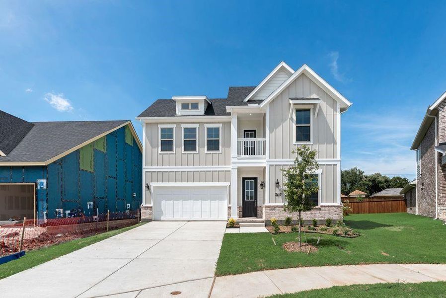 Front exterior of a new home in Bayside, Rowlett, TX, highlighting curb appeal (Image 20).