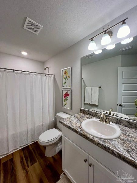 Furnished interior in a model home at Westpointe Place in Pensacola (Image 5).