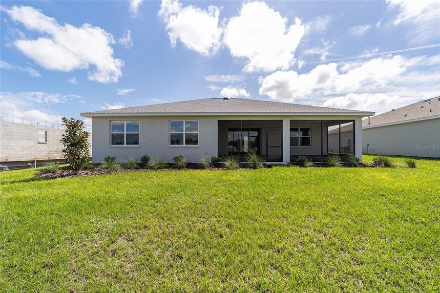Exterior details and patio area of a home in On Top of the World Communities, Ocala (Image 3).