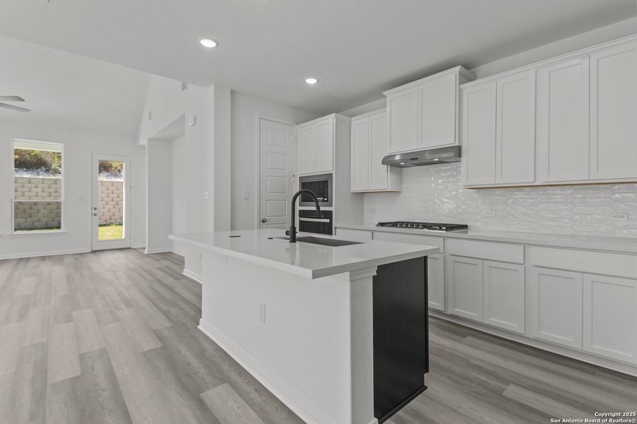 Furnished interior view inside a new home in Ladera 50', San Antonio (Image 7).