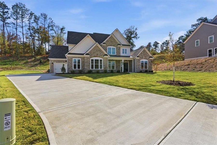 Front exterior of a new home in Ford Landing, Acworth, GA, highlighting curb appeal (Image 23).