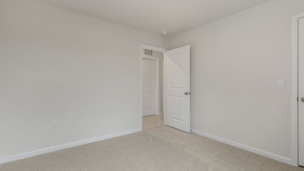 Spacious, unfurnished interior of a new home in The Grove at Matthews Landing, Fuquay Varina (Image 23).