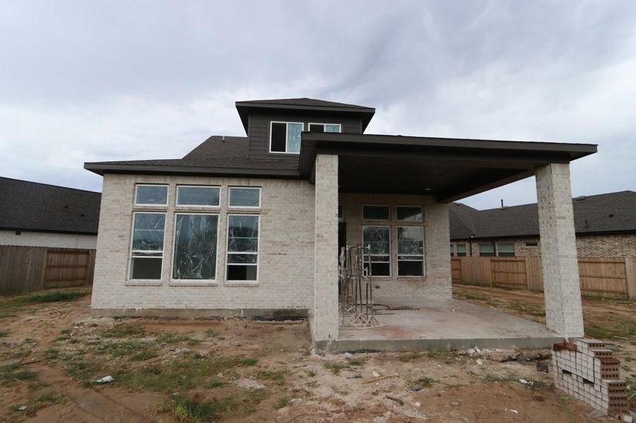 Exterior details and patio area of a home in ARTAVIA 45' Homesites, Conroe (Image 3).
