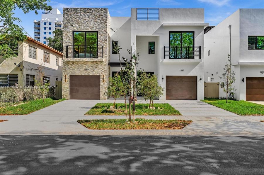 Front exterior of a new home in , Miami, FL, highlighting curb appeal (Image 23). Front exterior of a new home in , Miami, FL, highlighting curb appeal (Image 23).