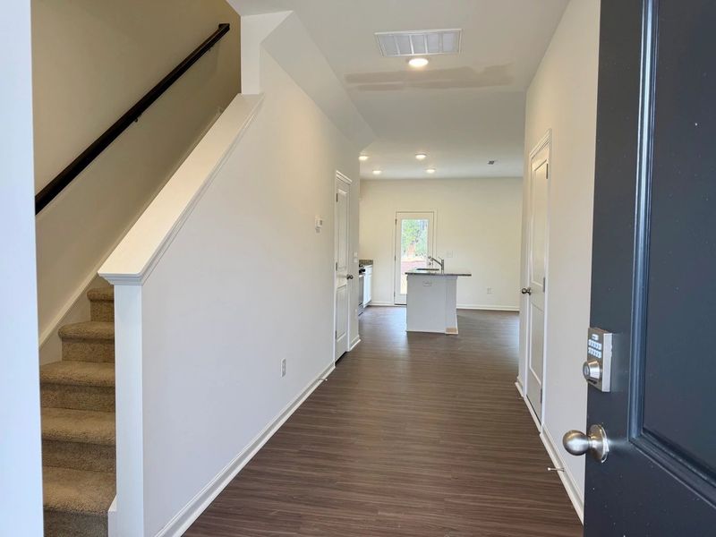 Foyer - An entry with sleek tones and flair.
