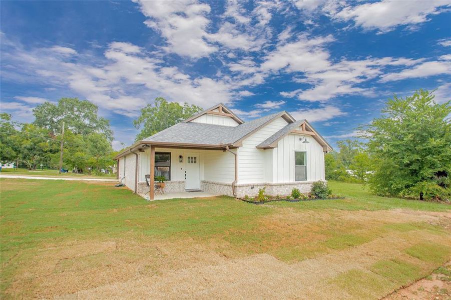 Front exterior of a new home in , Troup, TX, highlighting curb appeal (Image 23). Front exterior of a new home in , Troup, TX, highlighting curb appeal (Image 23).