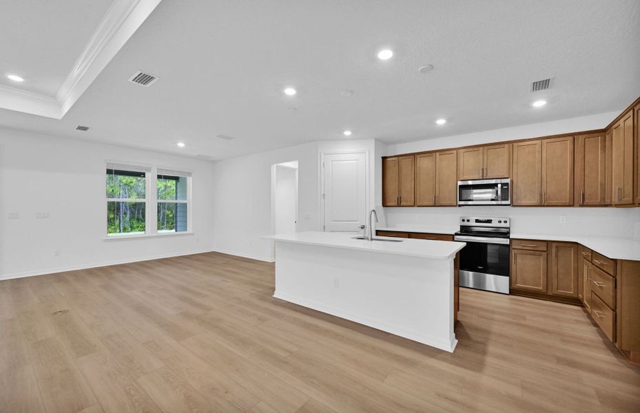 Furnished interior view inside a new home in Hyland Trail, Green Cove Springs (Image 6).