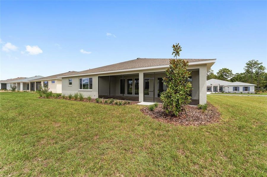 Front exterior of a new home in On Top of the World Communities, Ocala, FL, highlighting curb appeal (Image 1).
