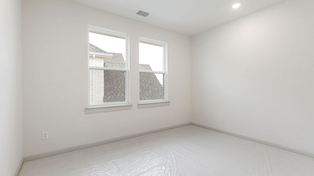 Representative unfurnished interior of a home built from the Toulouse II by Normandy Homes in Rainwater Crossing, Celina (Image 13).