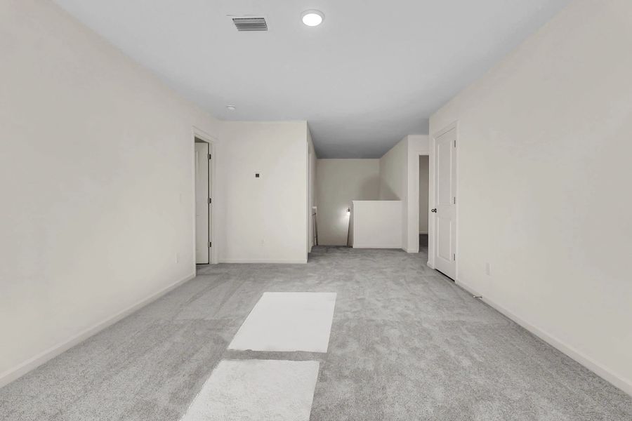 Representative unfurnished interior of a home built from the Supernova by Starlight Homes in Carmel East, Pflugerville (Image 20).