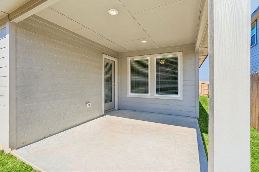 Exterior details and patio area of a home in Pine Lake Cove - Premier Series, Montgomery (Image 24).