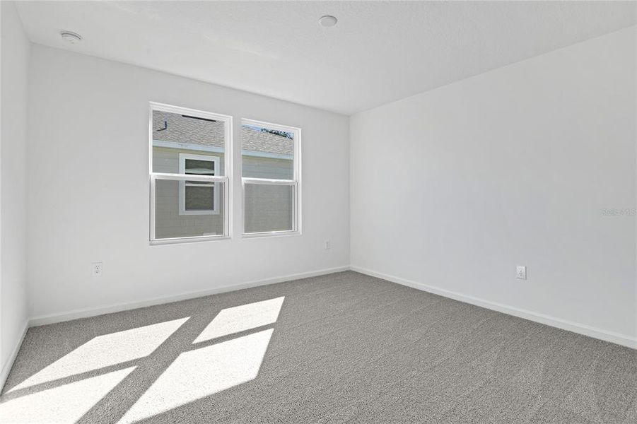 Spacious, unfurnished interior of a new home in Seasons at Shores of Lake Dell, Dundee (Image 16).