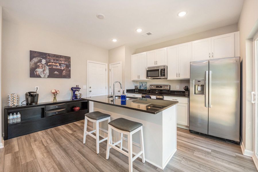 Furnished interior view inside a new home in , North Charleston (Image 15).