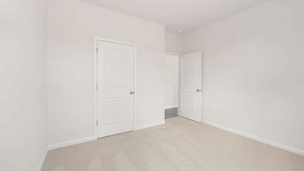 Spacious, unfurnished interior of a new home in Shahbain Reserve, Raeford (Image 23).
